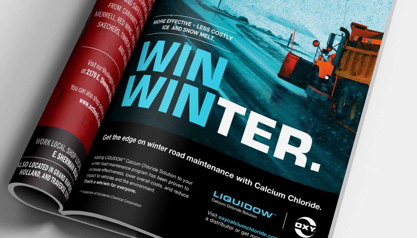 A magazine ad for OxyChem with the headline win winter and a photo of a snow plow