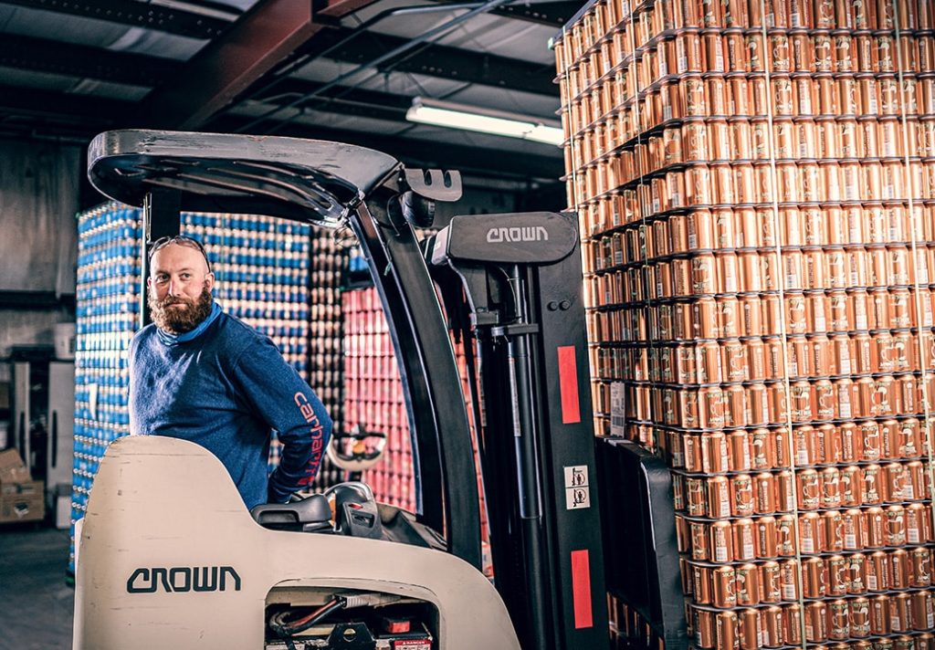Man in the Michigan Beverage Collective warehouse