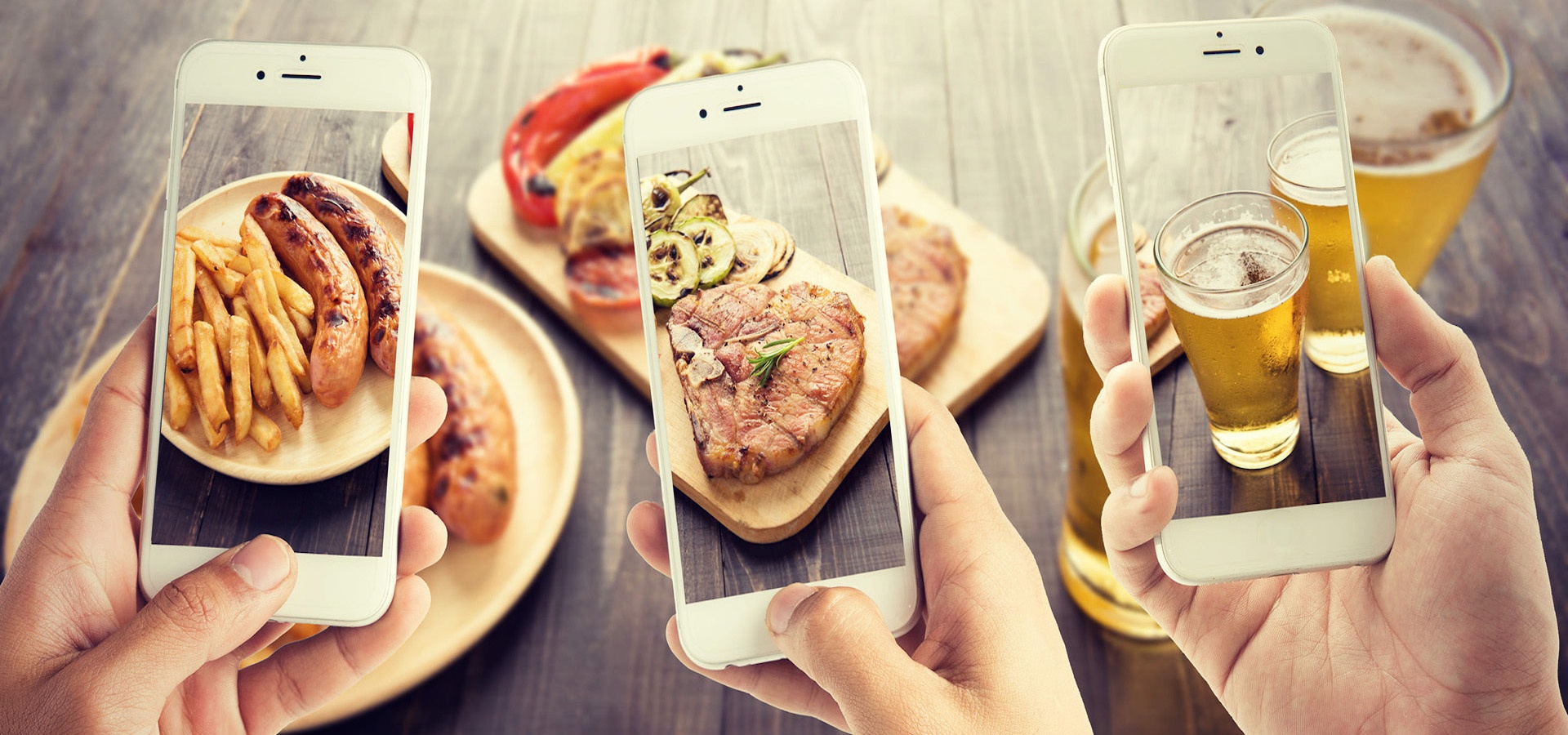 Smartphone pictures of hot dogs, fries, steak and beer